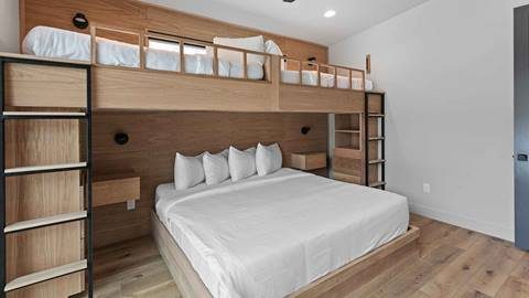 Deer Valley second bunk room — white oak with black metal ladder and built-in storage